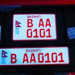 नेपाल इम्बोस्ड नम्बर प्लेट, नम्बर प्लेट विवाद नेपाल, embossed number plate Nepal, भ्रष्टाचारको साइनबोर्ड, नेपालमा नम्बर प्लेट शुल्क, यातायात विभाग विवाद, अंग्रेजी नम्बर प्लेट, नेपाली भाषा नम्बर प्लेट, embossed plate corruption Nepal, mandatory embossed plate Nepal