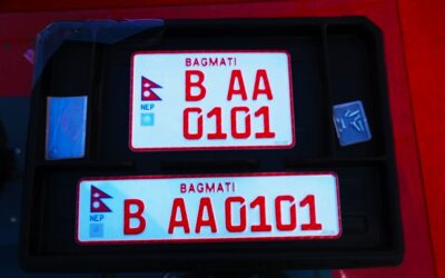 नेपाल इम्बोस्ड नम्बर प्लेट, नम्बर प्लेट विवाद नेपाल, embossed number plate Nepal, भ्रष्टाचारको साइनबोर्ड, नेपालमा नम्बर प्लेट शुल्क, यातायात विभाग विवाद, अंग्रेजी नम्बर प्लेट, नेपाली भाषा नम्बर प्लेट, embossed plate corruption Nepal, mandatory embossed plate Nepal